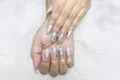 Regular or Gel Mani-Pedi for a Refresh of Your Beautiful Hands, Crafted by Quality Professionals (Up to 20% Off) - Second Medium