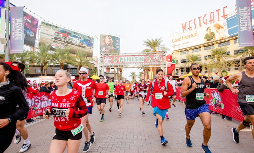 Image 1: Up to 29% Off Holiday Themed Fun Run - Santa Hustle San Antonio