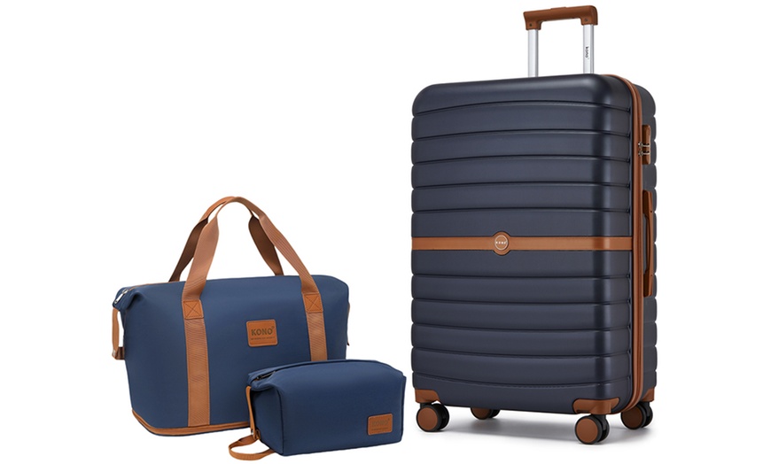 Image 2: Set de viaje azul marino con maleta rígida, bolsa de mano y neceser