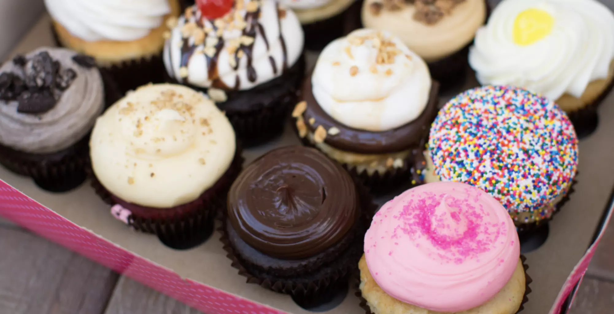 Half or One Dozen of Signature Cupcakes or $30 or 50 Voucher