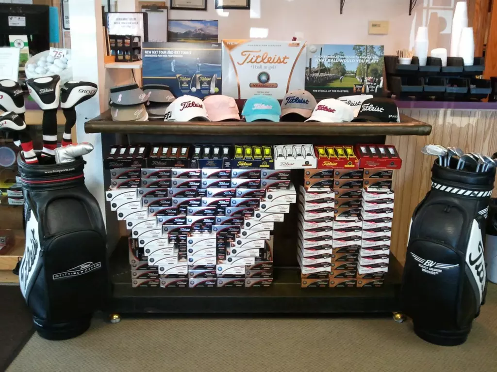 Experience 18 Holes Golf with Cart, Range Balls, and Scenic Elevation