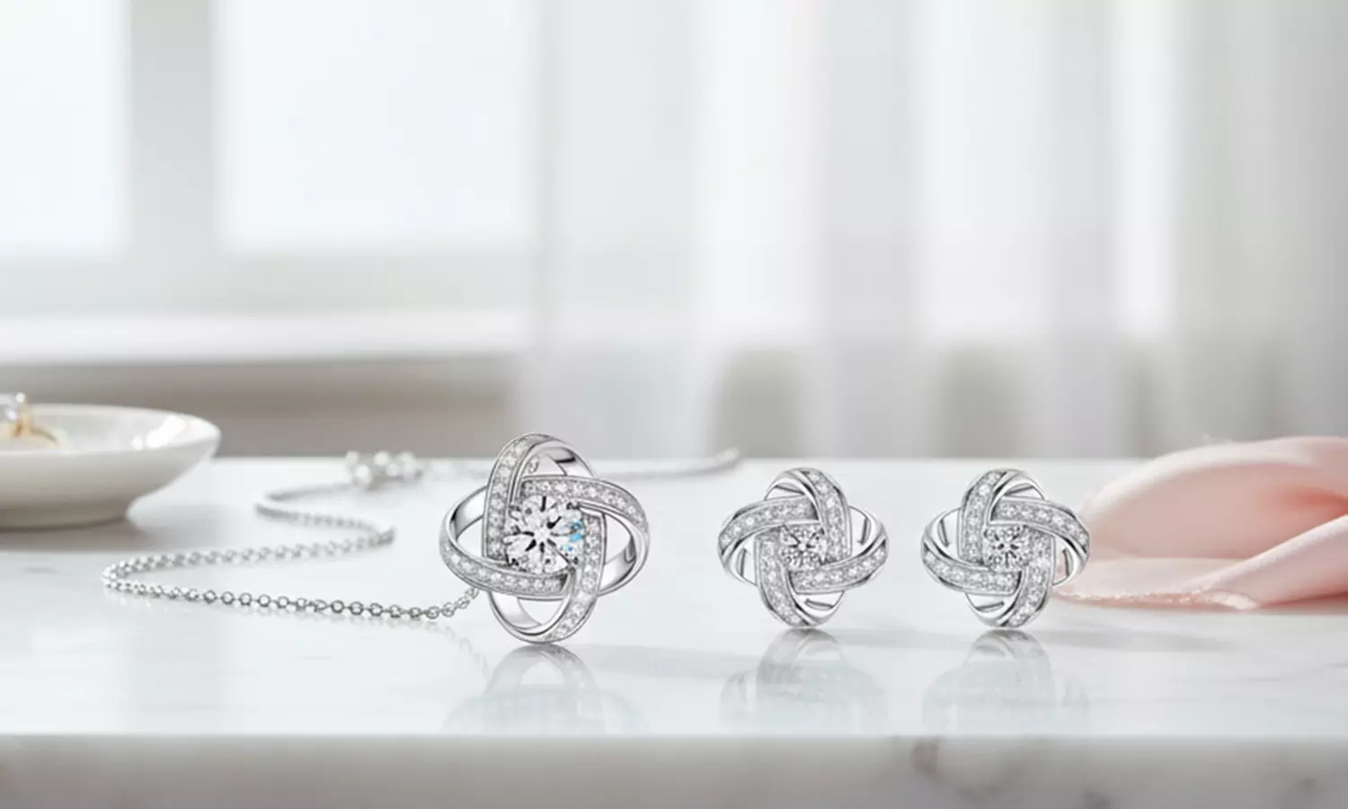 Crystal Love Knot Necklace or Earrings Made With Crystals From Swarovski