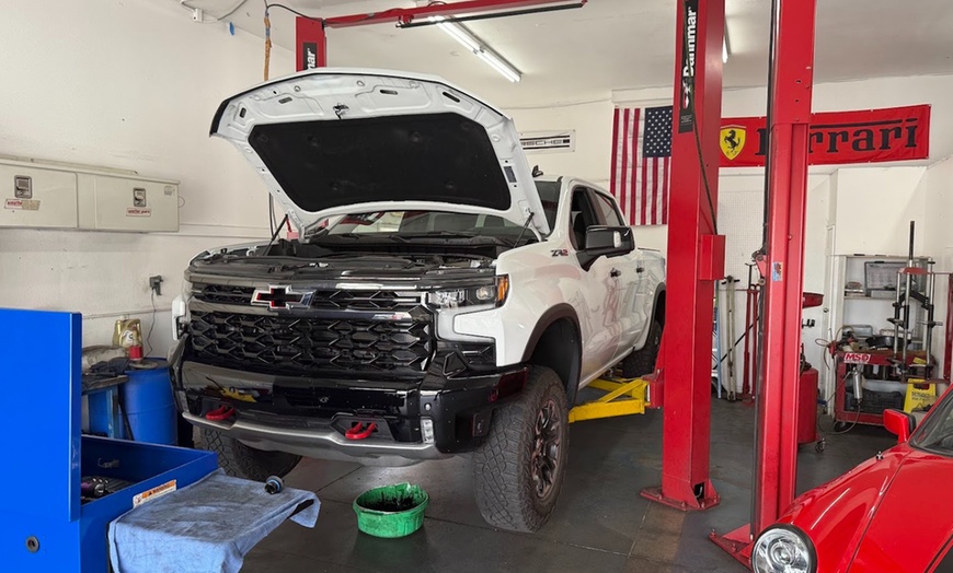 Image 5: Essential Vehicle Maintenance: Oil Changes, Brakes & Coolant Flushes