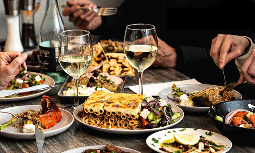 Image 1: Enjoy a Sizzling Mix Grill Platter with Wine/Beer at Odos Tsimiski Greek Cuisine