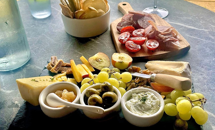 Image 3: Unforgettable Wine and Cheese Tasting with Optional Charcuterie Awaits