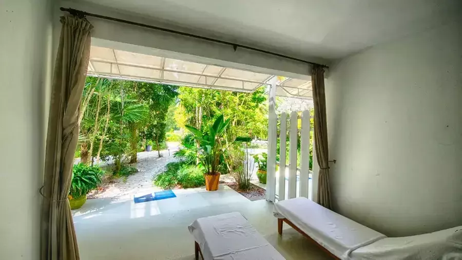 Relax by the water with stunning views and tropical vibes