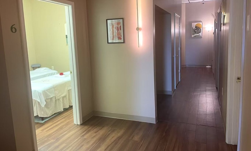 Image 5: Massages for 1 or 2 with Hot Towels, Organic Massage Oil and Lemon Tea