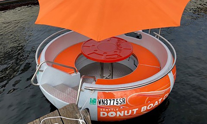 Image 2: Sail into Adventure: Cruise the Waves with Donut Boat Rentals!