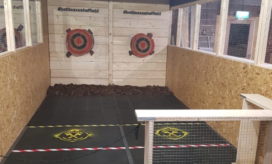 Image 6: Unleash Your Inner Warrior: Axe Throwing Sessions for Thrill-Seekers