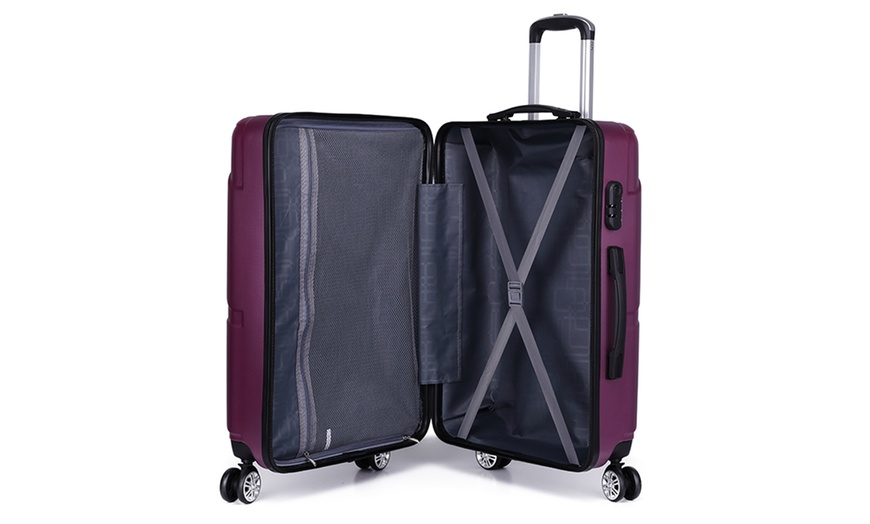 Image 4: One or Three Kono Purple Suitcases