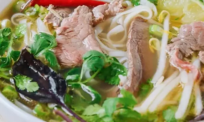 Tasty Pho Restaurant offers authentic Vietnamese cuisine options for any occasion, with up to 33% off. - Primary Image
