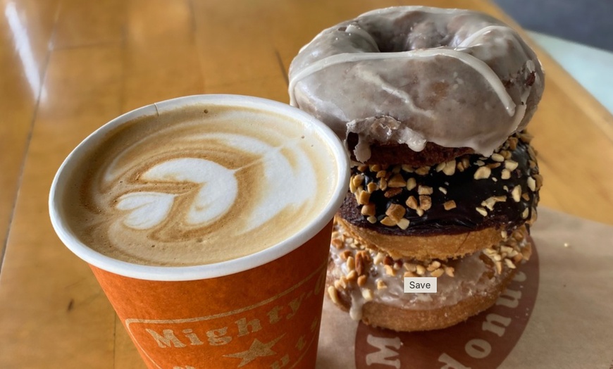 Image 11: Up to a Dozen Donuts, 4 Donuts & 2 Drinks or $50 to Spend