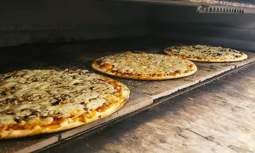 Pizza Lovers’ Special: $10 Credit, 12” Cheese Pizza & Soda, or 16” 1-Topping Pizza & Drinks! (Up to 37% Off) - Primary Image