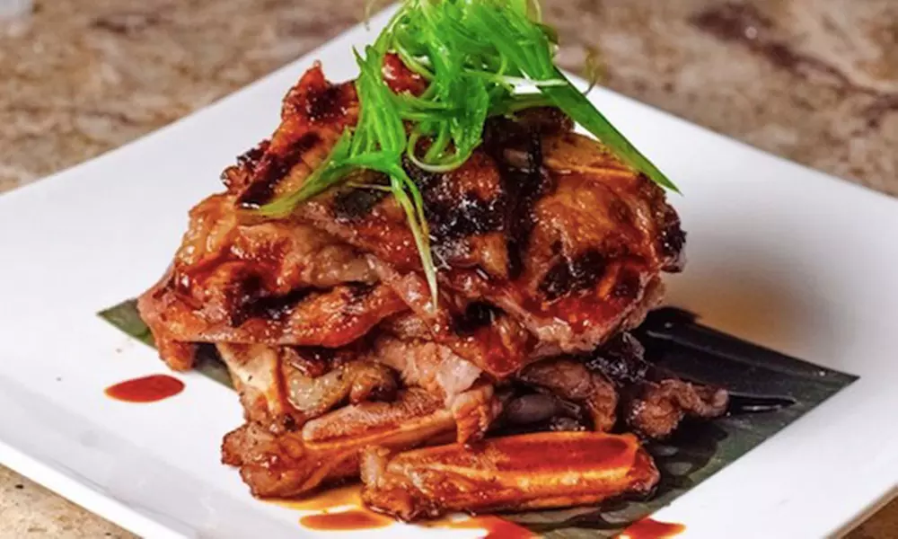 Savor $50 Dining Credit or Dinner with Cocktails for Two or Four