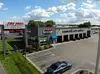 Oil Change + Free Tire Rotation & Car Wash at Tire Pros & Wheel Experts (Up to 49% Off)