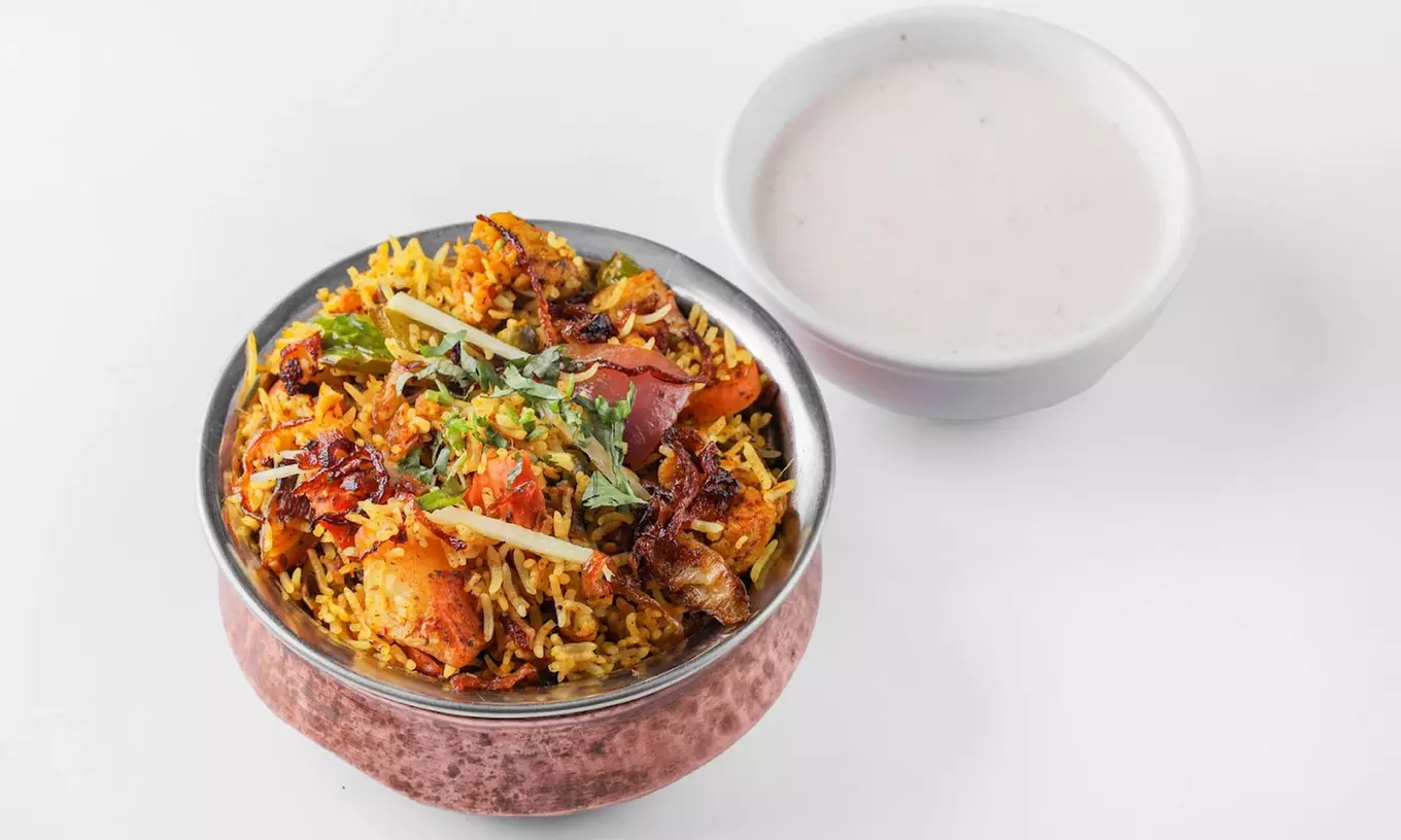 Authentic Indian Cuisine for Two, Four Person or Dining Credit