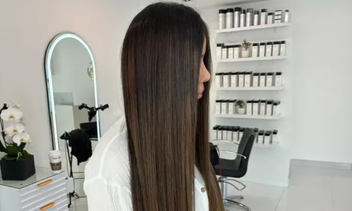 Brazilian Blowout Smoothing Treatment + Optional Haircut at Lux Hair Salon And Spa (Up to 55% Off) - Primary Image