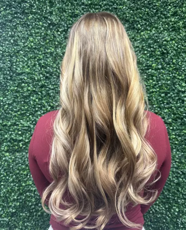 Smooth, Frizz-Free Hair with Brazilian Blowout & Haircut Options