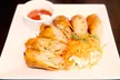 Explore Authentic Thai Dining for Two or Four - Appetizer, Entrees,Soft Drinks & Dessert - Up to 26% Off - Second Medium