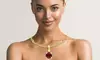 14k yellow gold plated 3 Cttw Round Ruby 18 Inch Necklace.