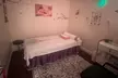 Up to 50% Off on Solo or Couples 60-Minute Bodywork and Essential Oils, Hot Stone Treatment at Junya Esthetics Spa - Second Medium
