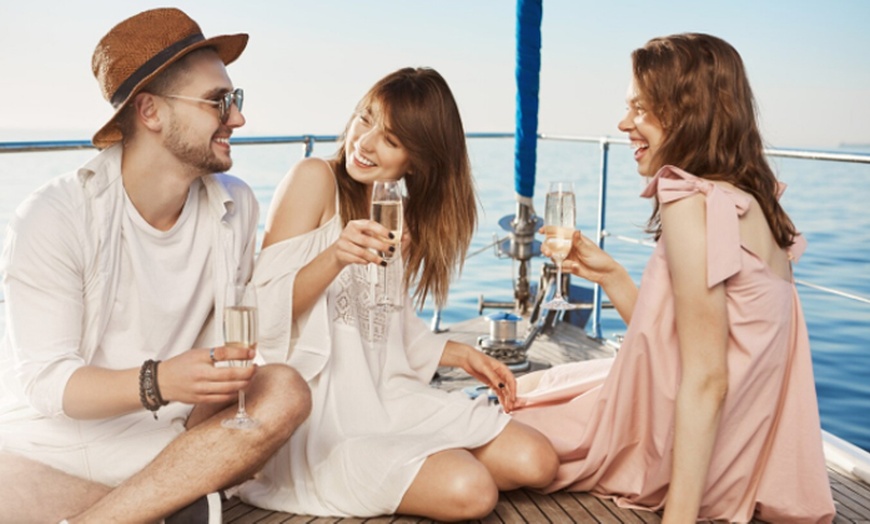 Image 7: Experiencia acuática de 1 h: paseo en barco y flotador de arrastre