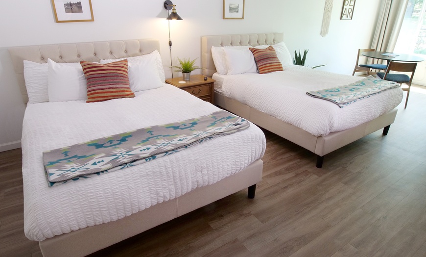 Image 9: Relax by the pool with lake views and mountain breezes