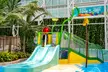 Dive into Tropical Fun + Kidz Club Bounce Zone: 11 Slides, Surf Simulator, Lazy River, Dining & Bars at Island Waterpark - Second Medium