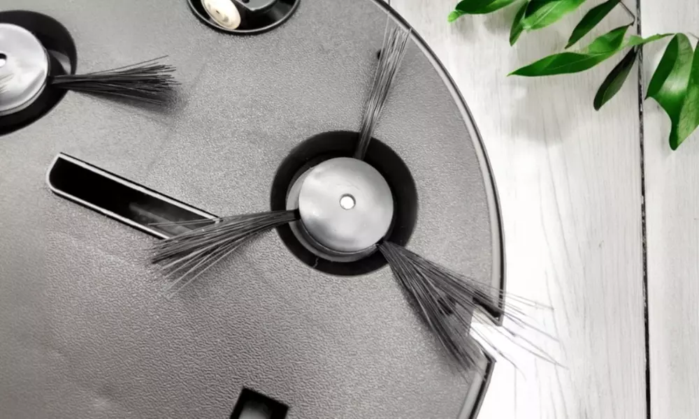 Robot aspirateur automatique avec brosses bilatérales