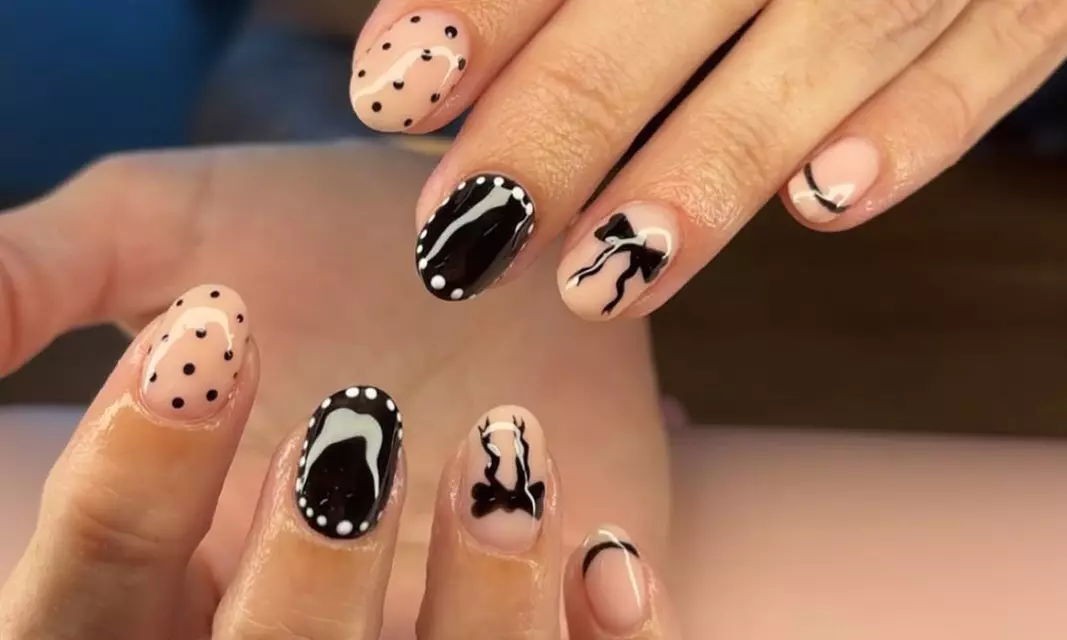 Stunning Nails Await with your Choice of Basic, Dip, or Gel Manicure