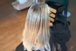 Haircut, Conditioner, and Blowdry with Optional Full Color, Partial, or Full Highlights (Up to 41% Off) - Second Medium