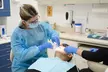 Essential Oral Care Awaits: Dental Cleaning with Dentist Exam and X-Rays Included (Up to 58% Off ) - Second Medium