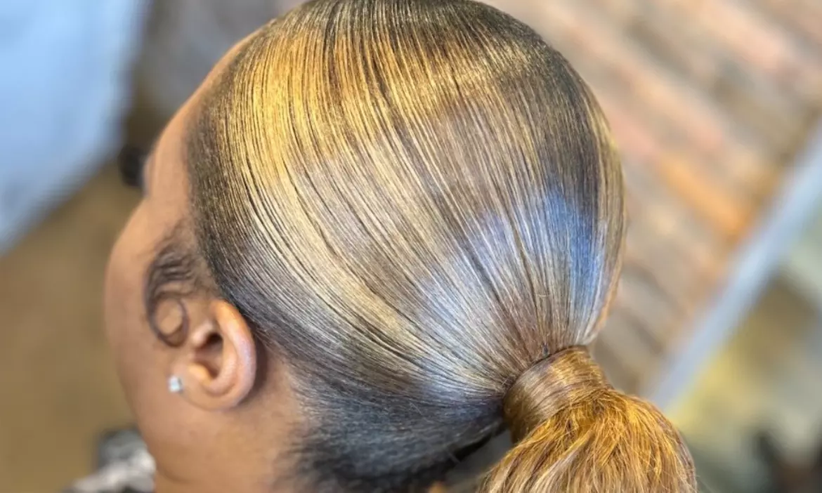 Transform Your Look with Sleek Ponytail or Quick Weave at Raevans Beauty Bar ( Up to 15% Off ) - Primary Image