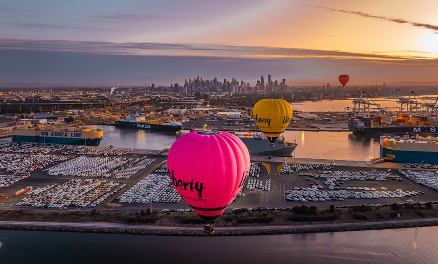 Image 3: Fly Over Yarra River & Melbourne's Iconic Landmarks During Sunrise