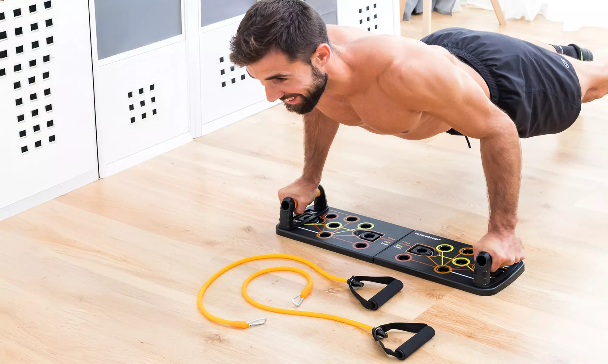 Tabla de flexiones Pulsher con bandas de resistencia y guía de ejercicios, de Innovagoods - Primary Image
