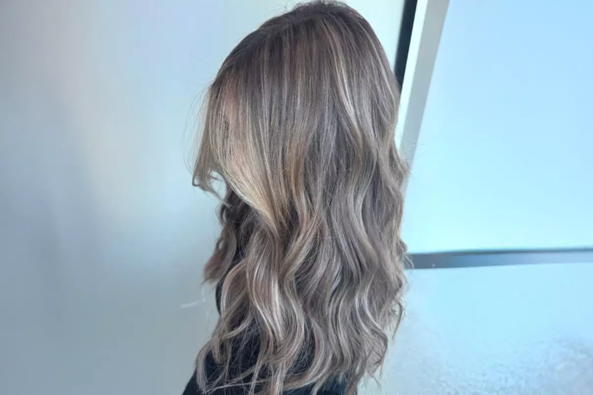 One Women's Haircut, Shampoo, Deep Conditioning, Blowdry and More