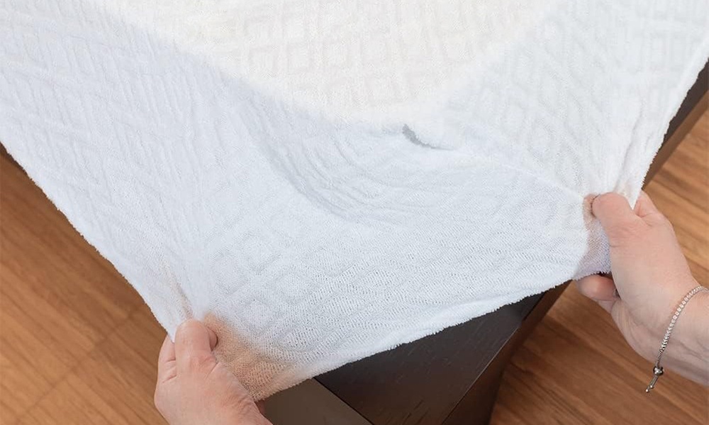 Protège-matelas en jersey éponge avec motif jacquard