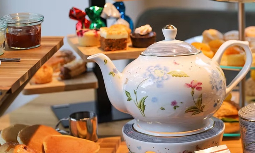 Image 4: Wandel, speel of knuffel met Husky’s  + optioneel een high tea