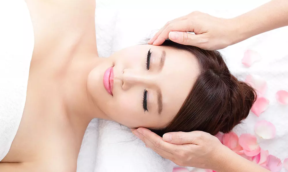 Swedish or Salt Stone Massage and Facial at Essential Wellness Spa - Lisa Thomas, LMT, LE (Up to 50% Off)  - Primary Image