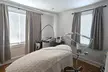 Get Smoother Skin with One or Two Intro 45-Minute Dermaplaning Facials and Brow Waxing at SkynRx (Up to 45% Off) - Second Medium