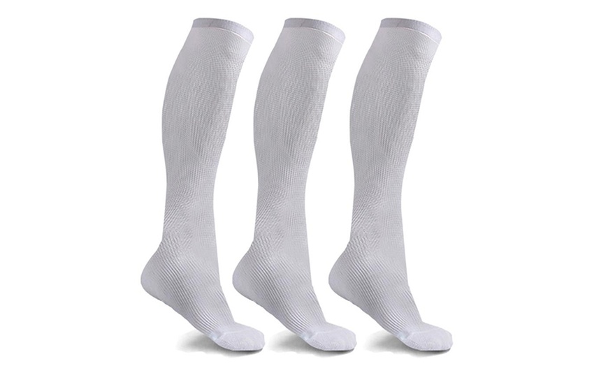 Image 6: 3-6 Pairs Knee-High Solid Compression Socks for Men & Women Graduated 15-20 mmHg