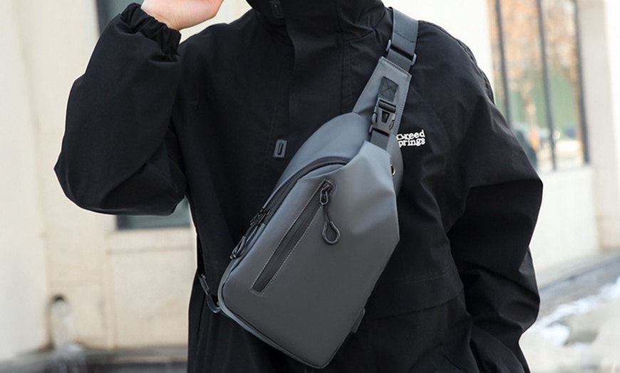 Image 1: Water-Resistant Anti-Theft Sling Bag with USB Charging Port