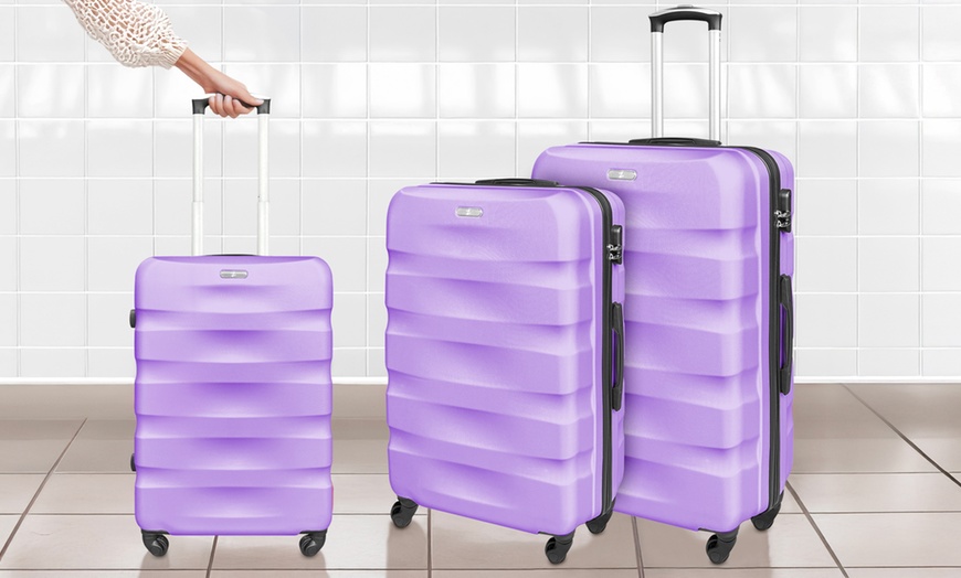 Image 11: Set da 3 valigie da viaggio in abs