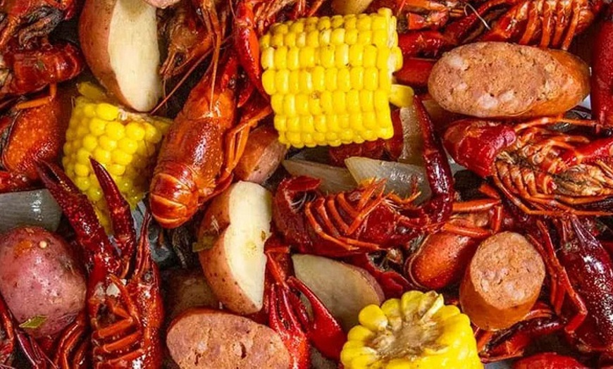 Image 4: Two Po'Boys, Meals for Two or Four With Beignets, and $50–$75 Credits