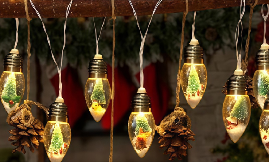 Image 6: Christmas Doll Solar-Powered String LED Decorative Lights