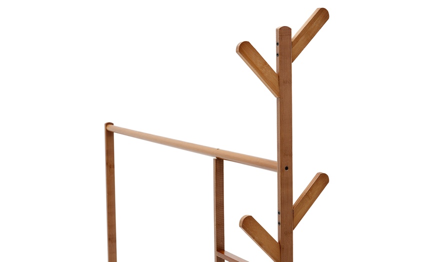 Image 6: Brown Bamboo Garment Rack with Wheels and  Bottom Shelf