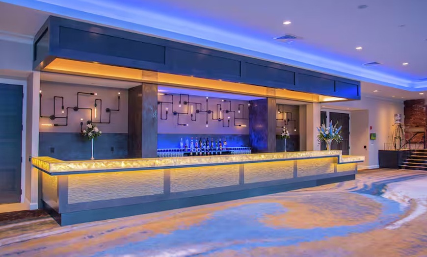 Image 12: Modern 4-Star Stay w/ Pool, Dining, & SNHU Arena Convenience