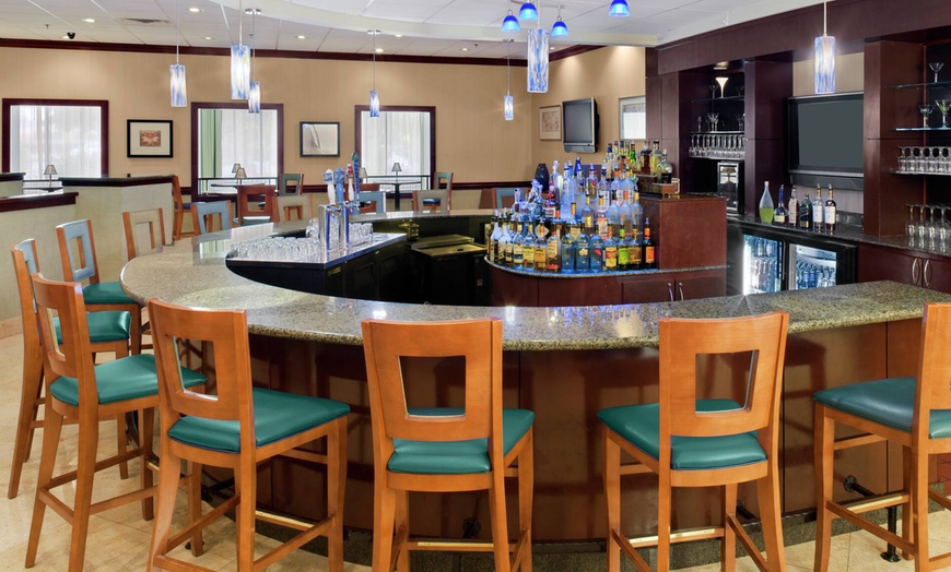 Image 9: Indoor pool, on-site dining, free parking & spacious rooms