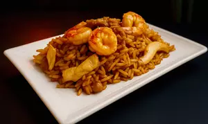 Un viaje de sabores: menú asiático fusión para 2 personas entrantes y principales al 35%