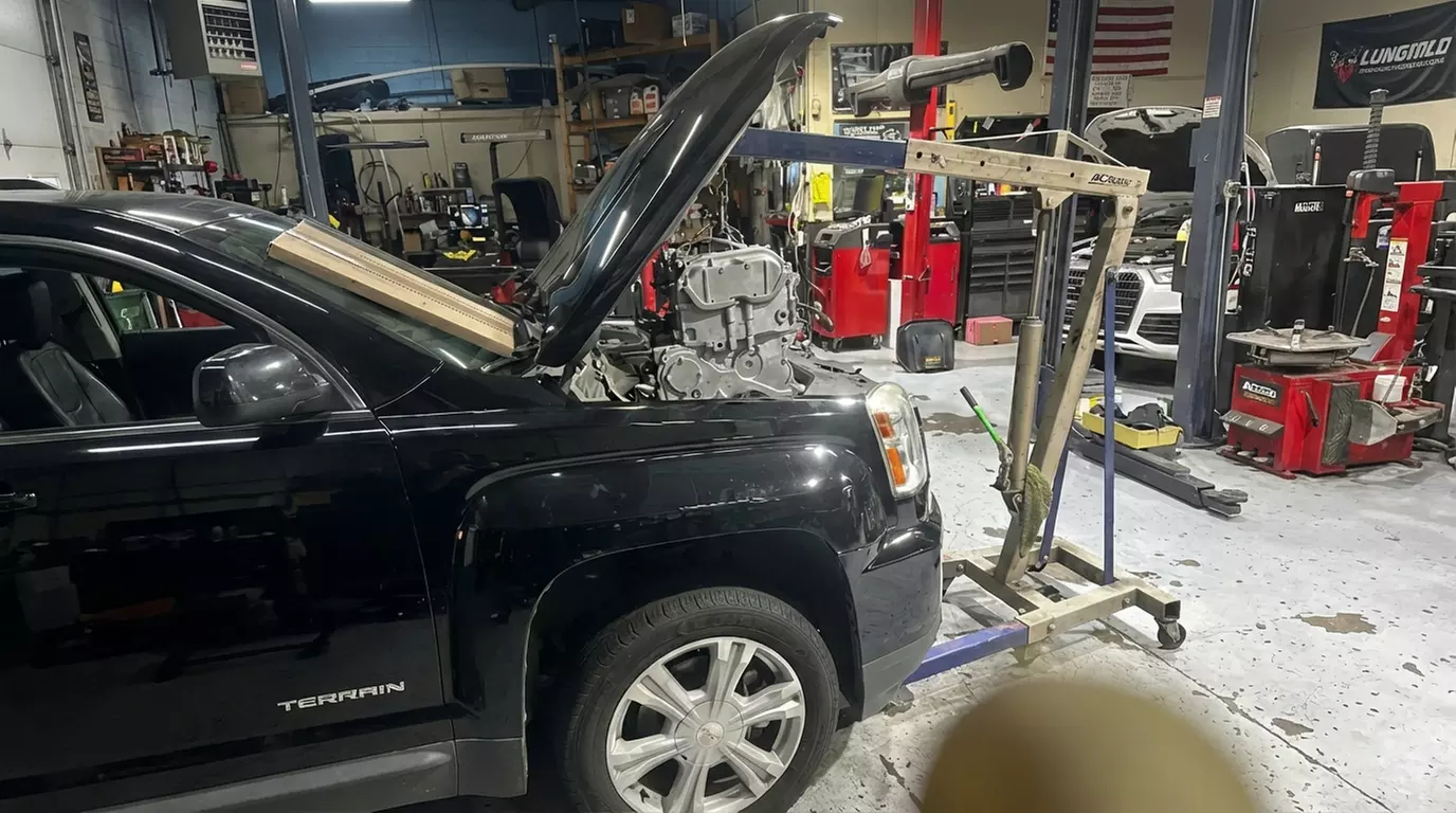 Full Synthetic Oil Change + Brake or Multi-Point Inspection / Tire Rotation / Wheel Alignment - Up to 33% Off - Second Medium